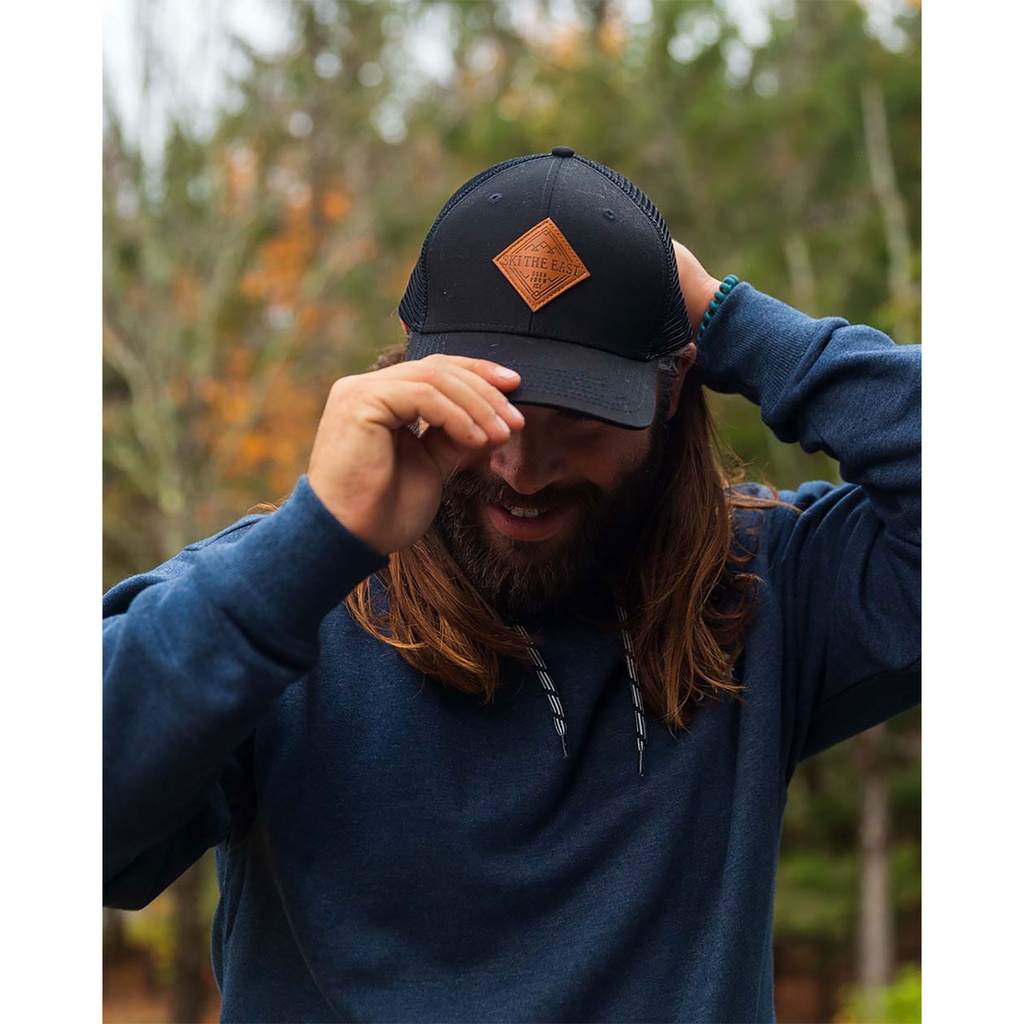 Ski The East Born From Ice Trucker Hat